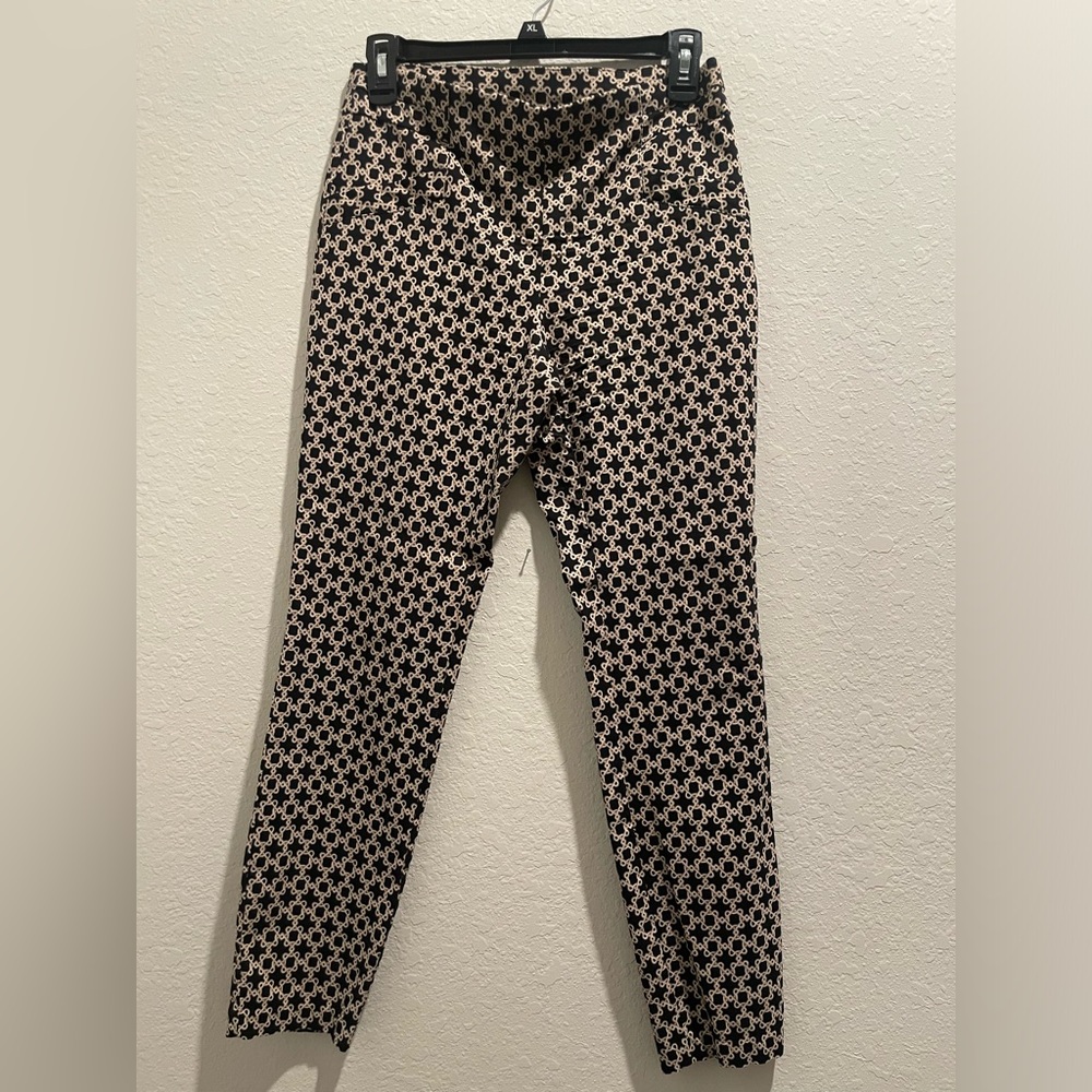 Ankle cropped Joe B fitted pants with rich pattern/design.